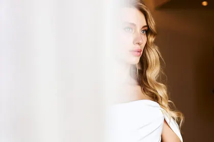 Wedding — bridal portrait by the window